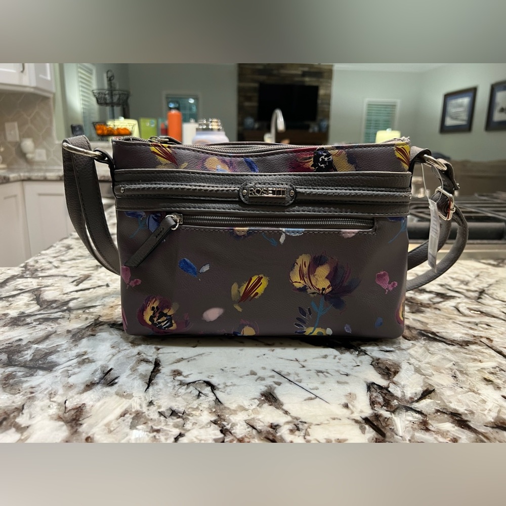 Brand new floral shoulder/cross body bag.